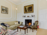 Deer Park drawing room with fire